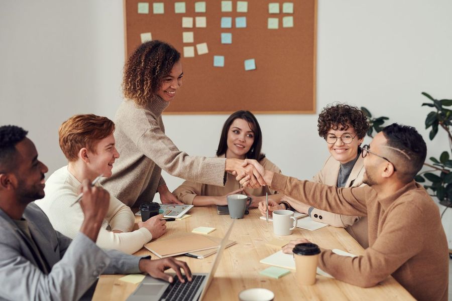 A team in conversation around a table